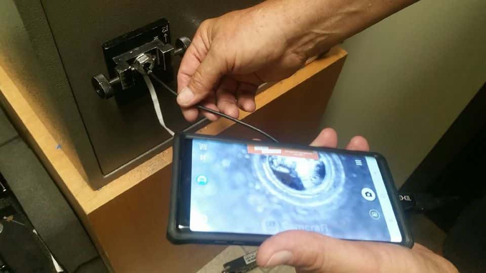 Using an endoscope to unlock a safe